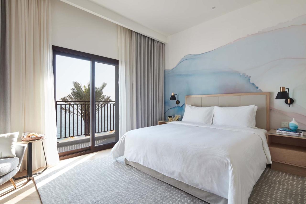 Vida Beach Resort Umm Al Quwain Luaran gambar A bedroom at the hotel