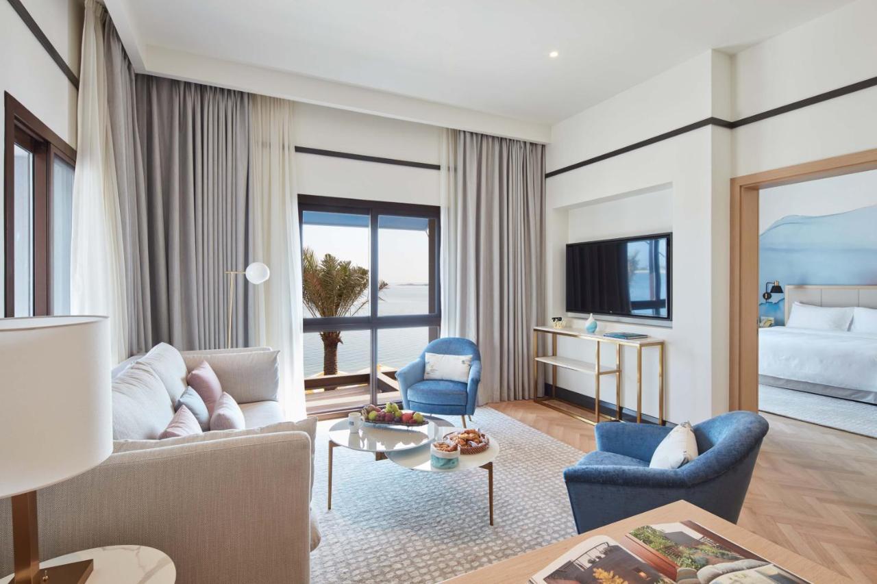 Vida Beach Resort Umm Al Quwain Luaran gambar A suite at the hotel