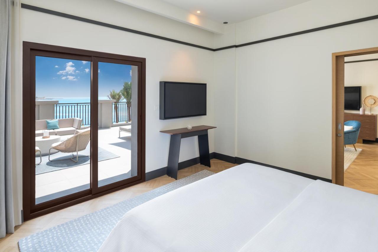Vida Beach Resort Umm Al Quwain Luaran gambar A bedroom at the hotel
